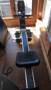 Infiniti magnetic rowing exercise machine