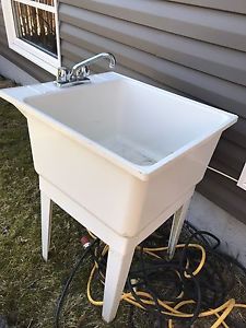 Laundry tub and taps 20$