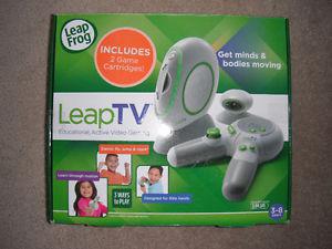 NEW LeapTV Educational Gaming System with 2 Game Cartridges