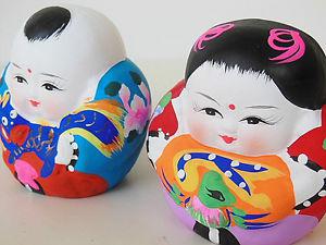 Oriental Pottery Couple Figurine Set