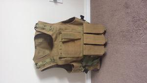 Paintball vest with tank pouch and extras