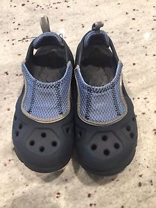 Size 8/9 croc sandals.