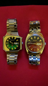 Two Ricoh automatic self-winding watches