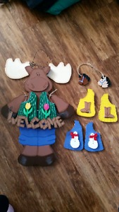 Wooden moose welcome sign