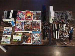 2 Wii Consoles + Lots of Accessories & Games