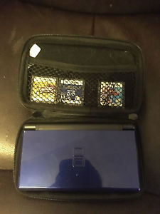 Blue Nintendo ds with 3 games and case
