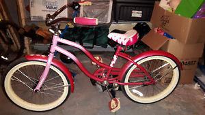 Kids pink huffy cruiser bike