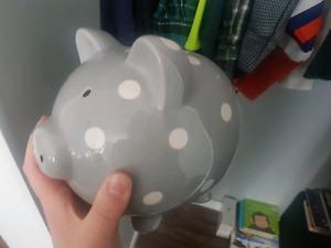 Large grey piggy bank. Been on shelf since purchase