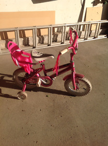 Little girl's pink bike