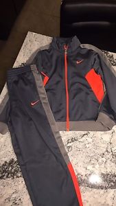 Nike sport jacket and pants, size 6.