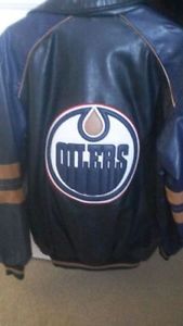 OILERS LEATHER JACKETS SIZES SMALL AND EXTRA LARGE