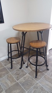 One round table two bar stools