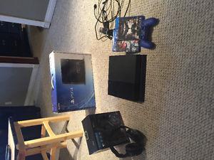 PS4, controller, 2 games & headset for sale.