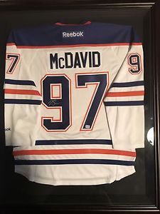 Autographed and framed Connor Mcdavid jersey