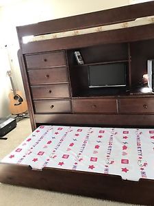 Cherry wood twin bunk bed.