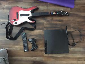 PS3 + 12 games and guitar