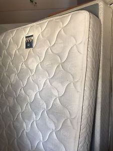 Queen Serta mattress and boxspring for sale.
