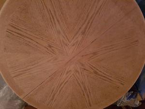 Round oak table with pedestal