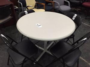 white table / folding chairs