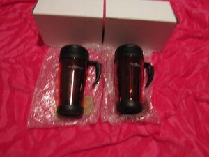 2 carry on mugs