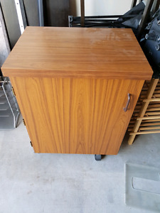 Antique sewing machine and cabinet
