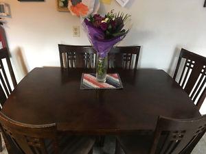 Beautiful wooden dining table and chairs