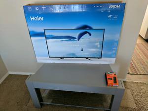 Brand New Haier 40 inch Tv with Stand and Amazon Fire TV