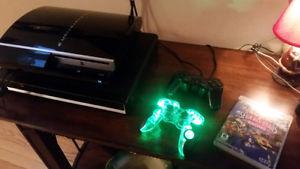 PS3 with 2 controllers and 3 games