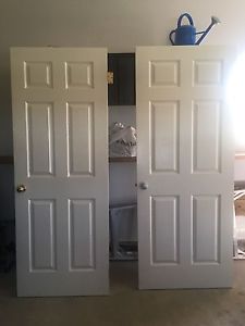 Two solid wood indoor doors