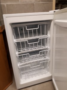 Apt very small upright freezer