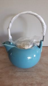Brand new Teavana turquoise t-pot with metal filter in it,