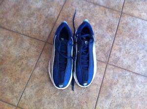 Men's size 8 blue and white running shoes. New condition.