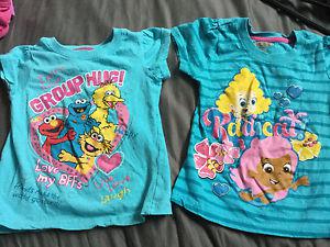 Sesame Street and bubble guppies shirts