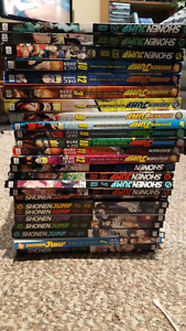 stack of Shonen jump manga / magazines