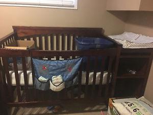 Crib with mattress change table change pad and 2 pad covers