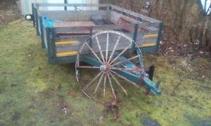 Multiple items, antique wagon wheel, steel lockers, farm