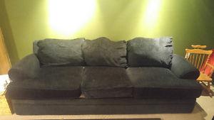 Two black la-z-boy couches
