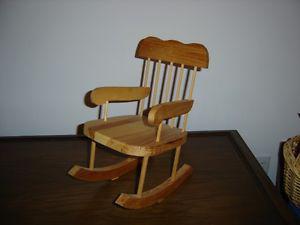 Wooden doll’s rocking chair