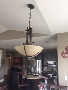 1 Dining room fixture with 2 matching pendant lights