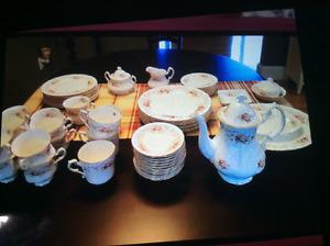 8 pieces china setting with extra pieces
