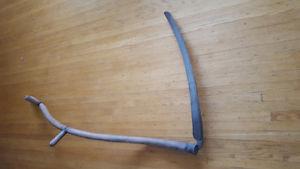Antique hay scythe and ice tongs