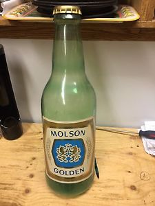 Molson golden beer sign advertising bottle
