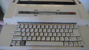 OLYMPIA ELECTRIC TYPEWRITER/ BRAND NEW/ INCL. ACCES.