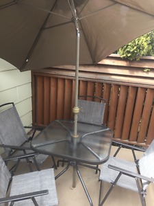 Patio Table w/ 4 Folding Chairs and Umbrella