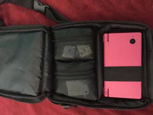 Pink Nintendo DSi, games, carrier case and charger