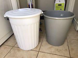 Two small garbage bins