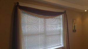 Window treatment with hooks included