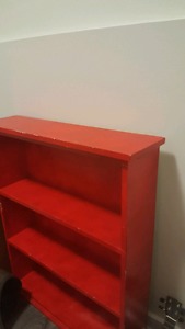 2 red book shelves