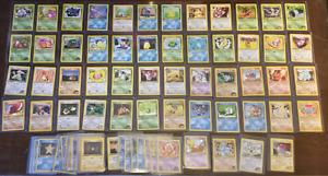 75 1st addition pokemon cards ()