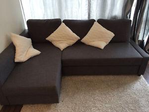 Corner sofa-bed with storage